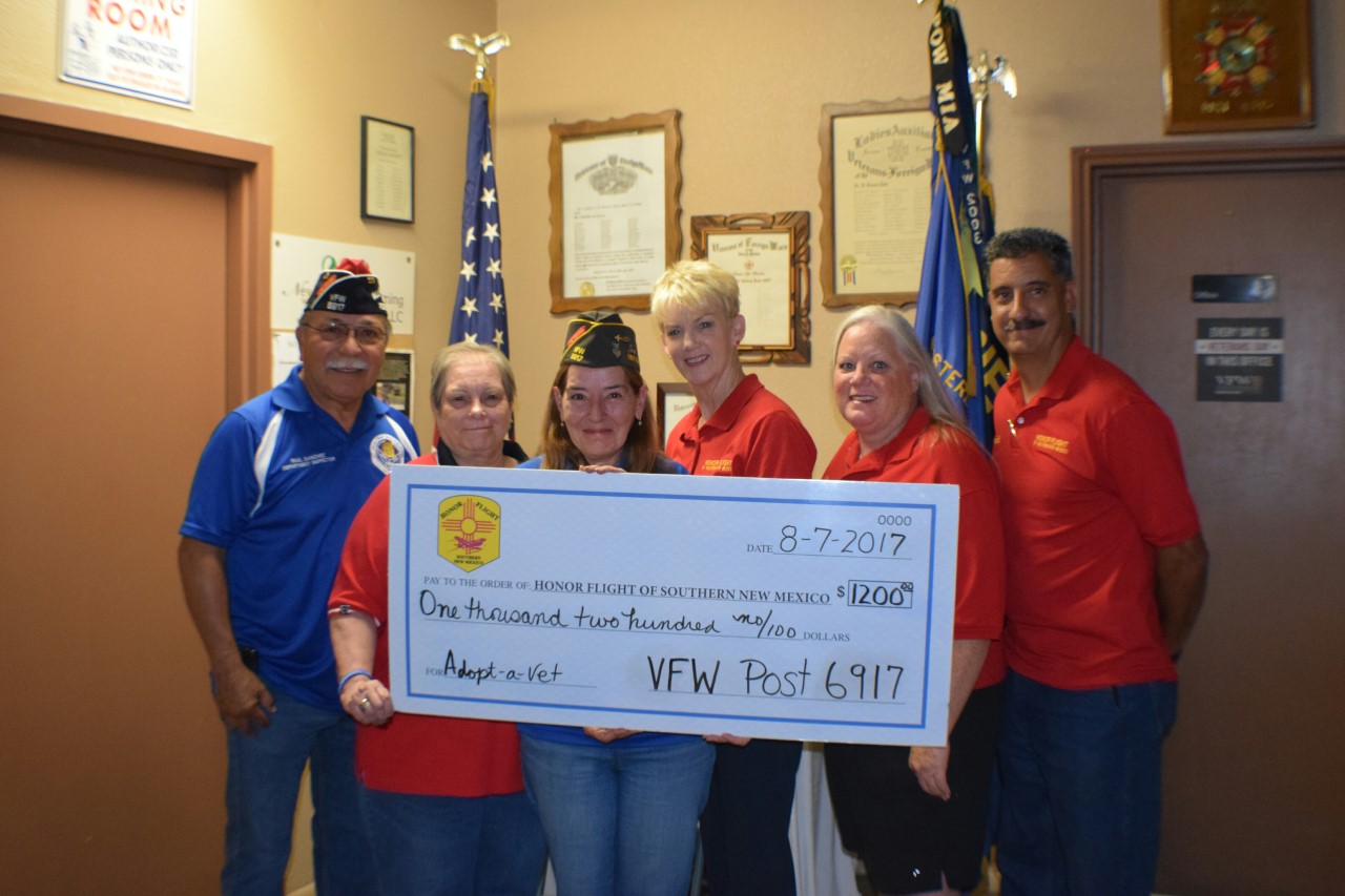 Our members gave the Honor Flight of Southern New Mexico a check to sponsor a WW2 veteran to go to the memorial in Washington DC. Pictured (left to right) Raul Sanchez Commander, Beth Miller Auxiliary President, Mary Tutza Quartermaster, Kathy Olson, Valerie Cano and Arnold Diaz, Honor Flight of Southern NM board members.

Photo by Shelby Dickinson